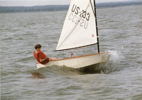 youth in boat, Optimist Dingies