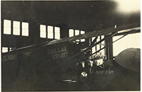 Dallas Spirit, Swallow Monoplane, in Airplane Hangar, photograph, [1927]