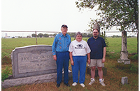 John Allen Judy Allen Knight and Eri Knight at George David and Mary Elizabeth Hollingsworth gravesite, Allen Family Cemetery