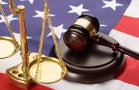 Justice Scale, gavel, and US flag