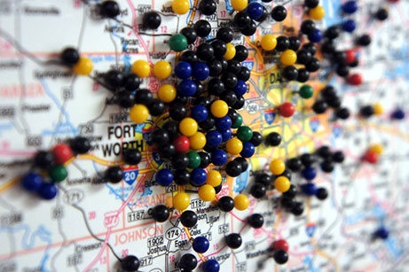 Map marked with push pins